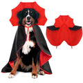 large dog wearing black and red vampire cape costume with stand-up collar